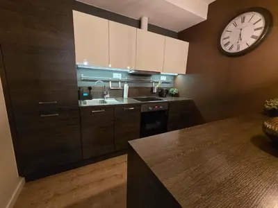 Kuchnia lub aneks kuchenny w obiekcie Apartament Centrum Krawiecka 1