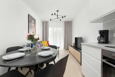 Kuchnia lub aneks kuchenny w obiekcie Stylish Apartment for 4 People with Underground Parking by Noclegi Renters