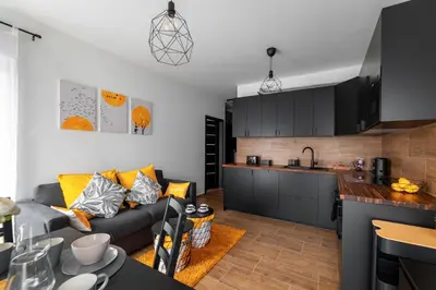 Kuchnia lub aneks kuchenny w obiekcie Apartament Czarny Dab