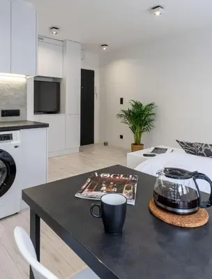 Kuchnia lub aneks kuchenny w obiekcie Matejki 17 Urban Studio Apartment ProperUNIT