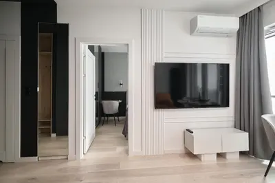 Telewizja i/lub zestaw kina domowego w obiekcie Platinum Apartment Quorum - Parking - Klimatyzacja - Self check in