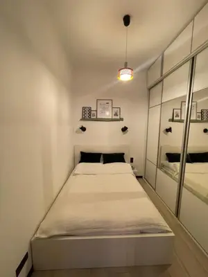 Łóżko lub łóżka w pokoju w obiekcie Iron Loft apartment
