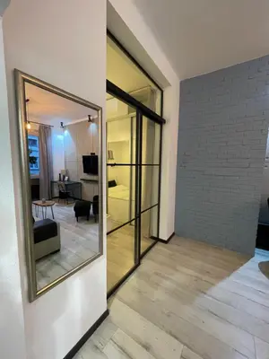 Telewizja i/lub zestaw kina domowego w obiekcie Iron Loft apartment