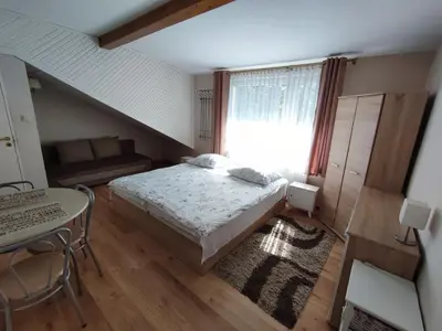Łóżko lub łóżka w pokoju w obiekcie Świerkówka Stronie Śląskie