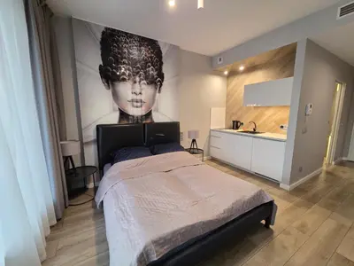 Łóżko lub łóżka w pokoju w obiekcie Apartamenty OVO