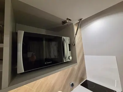 Telewizja i/lub zestaw kina domowego w obiekcie Apartamenty OVO