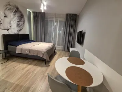 Łóżko lub łóżka w pokoju w obiekcie Apartamenty OVO