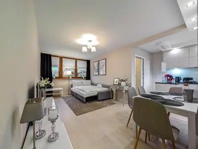 Kuchnia lub aneks kuchenny w obiekcie Drukarska Serenity Apartment by BookingHost
