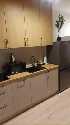 Kuchnia lub aneks kuchenny w obiekcie AmaMolto Gardens - włoskie apartamenty