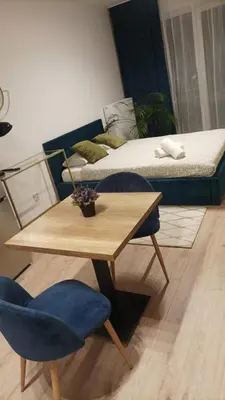 Łóżko lub łóżka w pokoju w obiekcie AmaMolto Gardens - włoskie apartamenty
