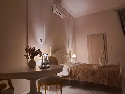 Łóżko lub łóżka w pokoju w obiekcie Poznaj Mickiewicza 3
