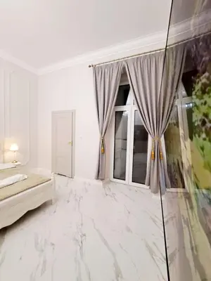 Łóżko lub łóżka w pokoju w obiekcie Poznaj Mickiewicza 3