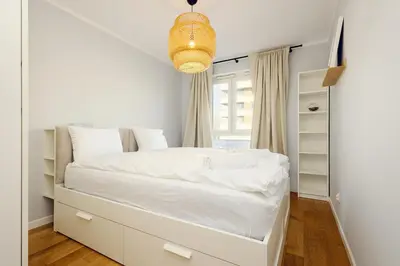 Łóżko lub łóżka w pokoju w obiekcie 3-Room Apartment Wrocław Centre near Market Square Free Parking