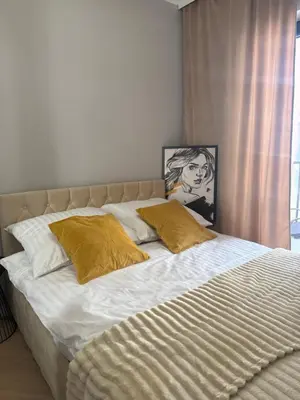 Łóżko lub łóżka w pokoju w obiekcie Apartament Comfort Wrocław