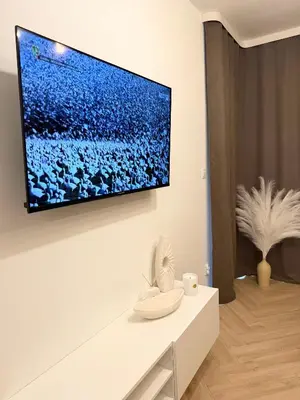 Telewizja i/lub zestaw kina domowego w obiekcie Apartament Comfort Wrocław