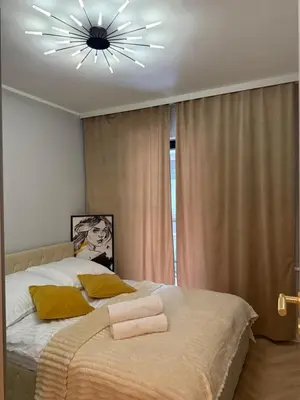 Łóżko lub łóżka w pokoju w obiekcie Apartament Comfort Wrocław