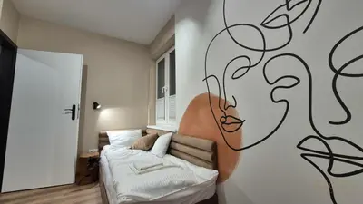 Łóżko lub łóżka w pokoju w obiekcie Black Hill Pod Zieleńcem Apartament BOHO Nr6 z Sauną