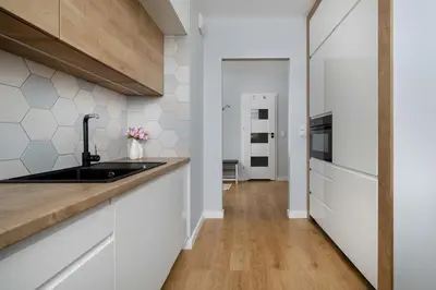 Kuchnia lub aneks kuchenny w obiekcie Bright Two Bedroom Apartment in Wrocław with Air Conditioning and Parking by Noclegi Renters