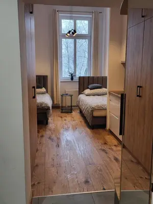 Łóżko lub łóżka w pokoju w obiekcie AS ELITE Apartament -Studio Centrum parking