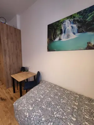 Łóżko lub łóżka w pokoju w obiekcie AS ELITE Apartament -Studio Centrum parking