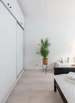 Łóżko lub łóżka w pokoju w obiekcie Brązowa City Comfort Apartment ProperUNIT