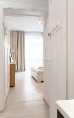 Łóżko lub łóżka w pokoju w obiekcie Brązowa City Comfort Apartment ProperUNIT