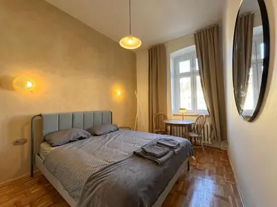 Łóżko lub łóżka w pokoju w obiekcie Kazimierza Wielkiego - quiet rooms in the city center