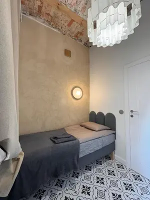 Łóżko lub łóżka w pokoju w obiekcie Kazimierza Wielkiego - quiet rooms in the city center