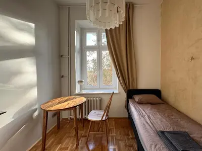 Łóżko lub łóżka w pokoju w obiekcie Kazimierza Wielkiego - quiet rooms in the city center