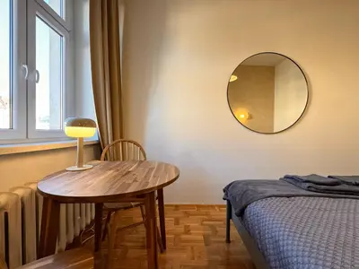 Łóżko lub łóżka w pokoju w obiekcie Kazimierza Wielkiego - quiet rooms in the city center