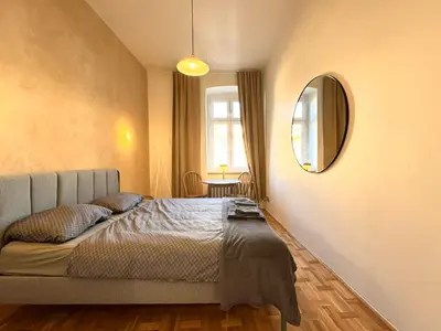 Łóżko lub łóżka w pokoju w obiekcie Kazimierza Wielkiego - quiet rooms in the city center