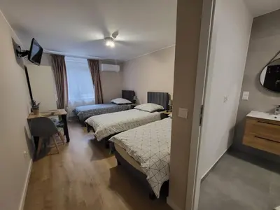 Łóżko lub łóżka w pokoju w obiekcie Pokoje Gościnne Karpacka 17 prywatne łazienki parking