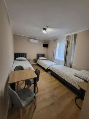 Łóżko lub łóżka w pokoju w obiekcie Pokoje Gościnne Karpacka 17 prywatne łazienki parking