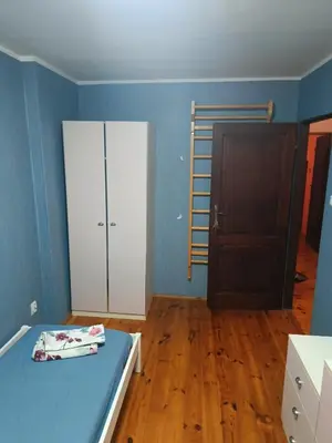 Łóżko lub łóżka w pokoju w obiekcie Słoneczna Przystań