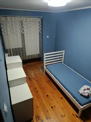 Łóżko lub łóżka w pokoju w obiekcie Słoneczna Przystań