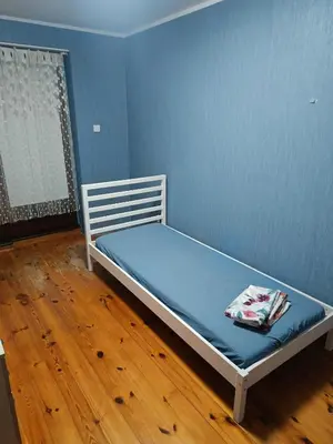 Łóżko lub łóżka w pokoju w obiekcie Słoneczna Przystań