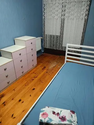 Łóżko lub łóżka w pokoju w obiekcie Słoneczna Przystań