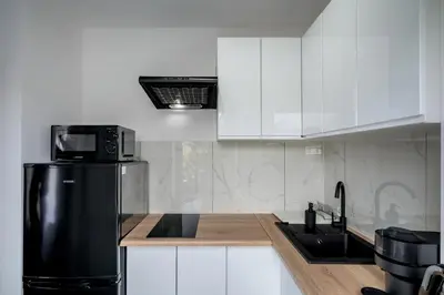 Kuchnia lub aneks kuchenny w obiekcie RentPlanet - Studio Oleśnicka