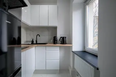 Kuchnia lub aneks kuchenny w obiekcie RentPlanet - Studio Oleśnicka