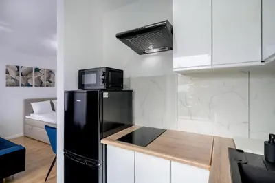 Kuchnia lub aneks kuchenny w obiekcie RentPlanet - Studio Oleśnicka