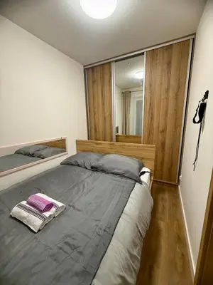Łóżko lub łóżka w pokoju w obiekcie Lawendowy Ogród