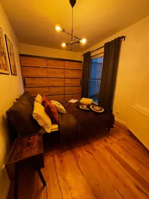 Łóżko lub łóżka w pokoju w obiekcie Green Port Loft Apartament 2-pokojowy z balkonem i garażem podziemnym
