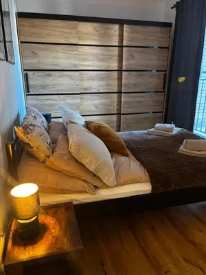 Łóżko lub łóżka w pokoju w obiekcie Green Port Loft Apartament 2-pokojowy z balkonem i garażem podziemnym