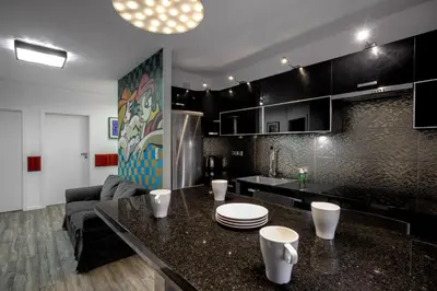 Kuchnia lub aneks kuchenny w obiekcie RentPlanet - Apartament Jedności Narodowej