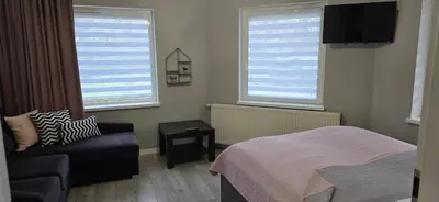 Łóżko lub łóżka w pokoju w obiekcie Domek NATI