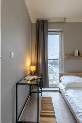 Łóżko lub łóżka w pokoju w obiekcie Kościuszki 83 Comfort Apartment Garage & Balcony ProperUNIT