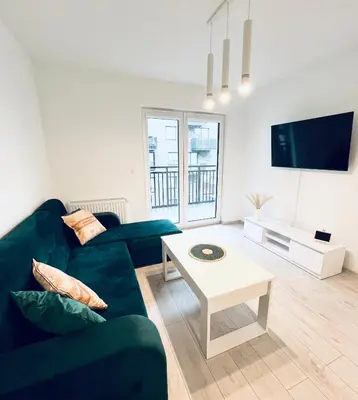 Telewizja i/lub zestaw kina domowego w obiekcie Apartamenty Sienkiewicza Residence 1