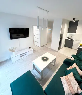 Telewizja i/lub zestaw kina domowego w obiekcie Apartamenty Sienkiewicza Residence 1
