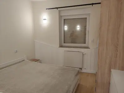 Łóżko lub łóżka w pokoju w obiekcie Apartament Juliusz Slowacki