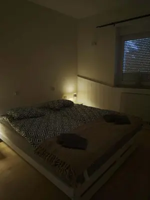 Łóżko lub łóżka w pokoju w obiekcie Apartament Juliusz Slowacki